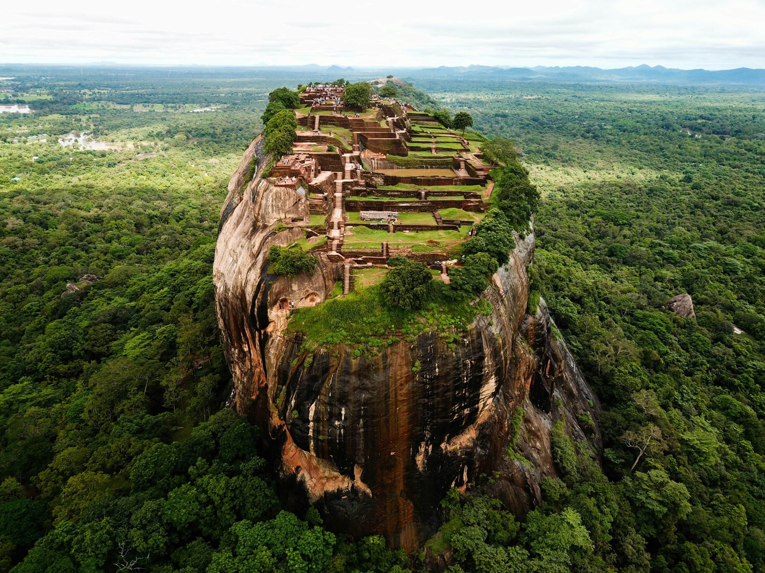 Sigiriya Lion Rock Fortress rising above emerald jungle in Sri Lanka